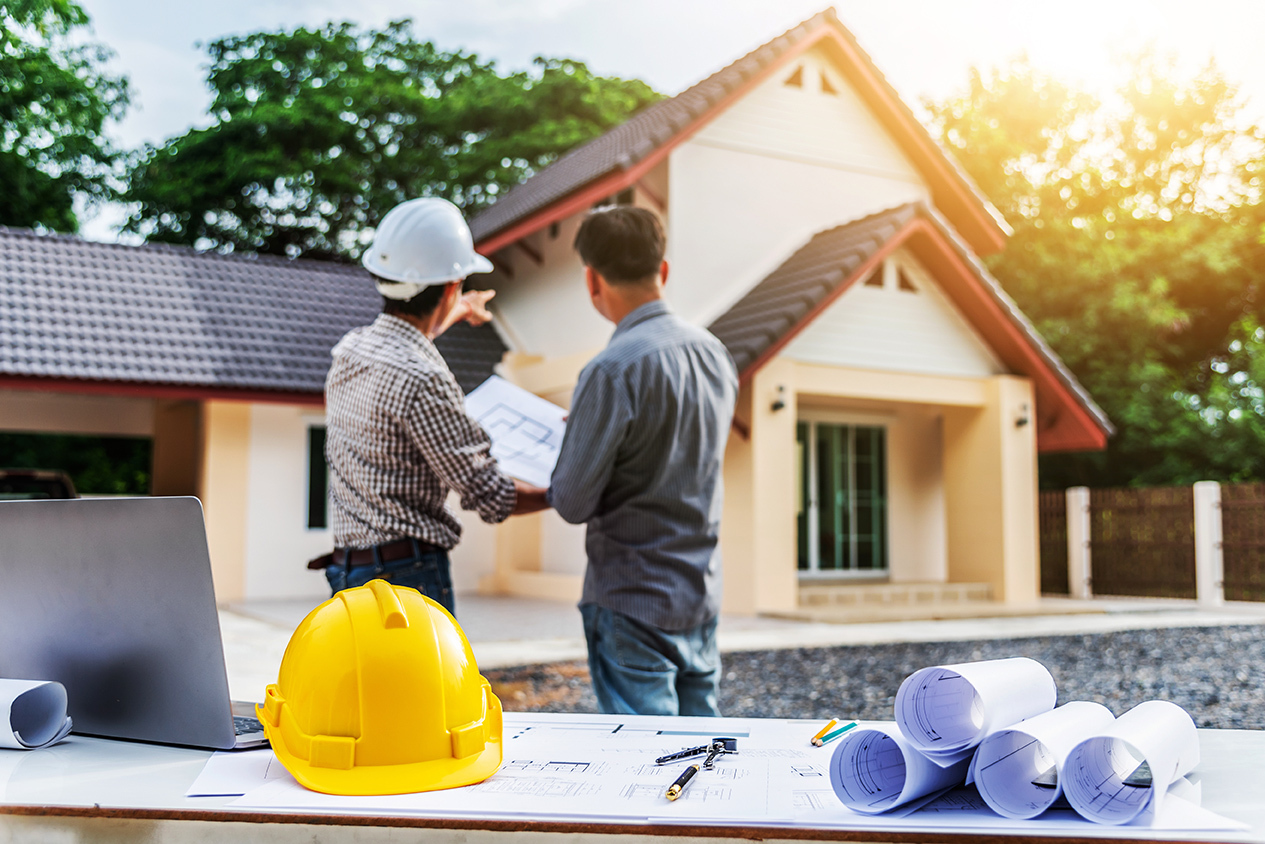 Two business man professional engineer worker at the house build